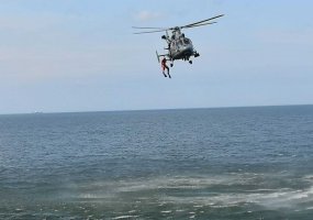 The Baltic Sea bursts into bloom: wreath tributes lowered onto the water from a ship and a... - 2